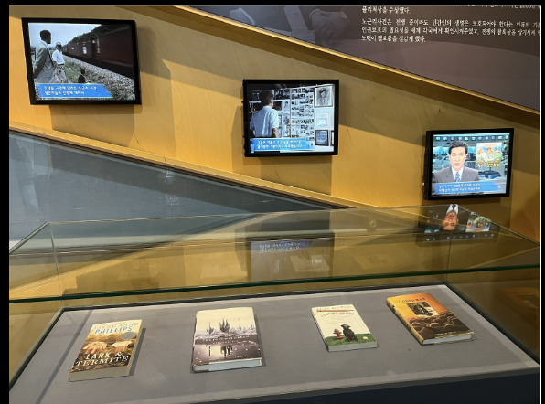 display with books and monitors